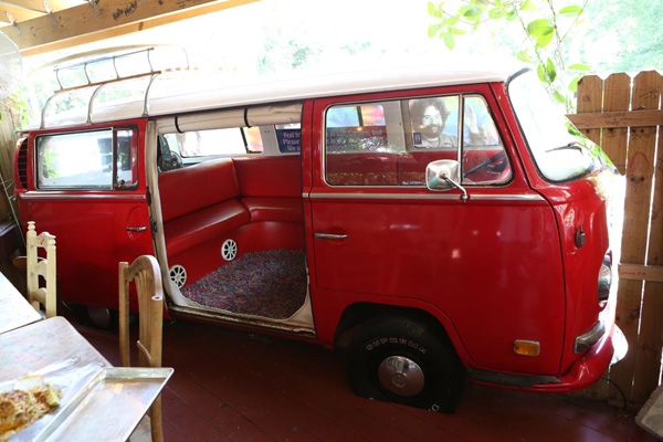 Restored VW minibus is one of the only places you cannot graffiti at Yellow Dog Eats.